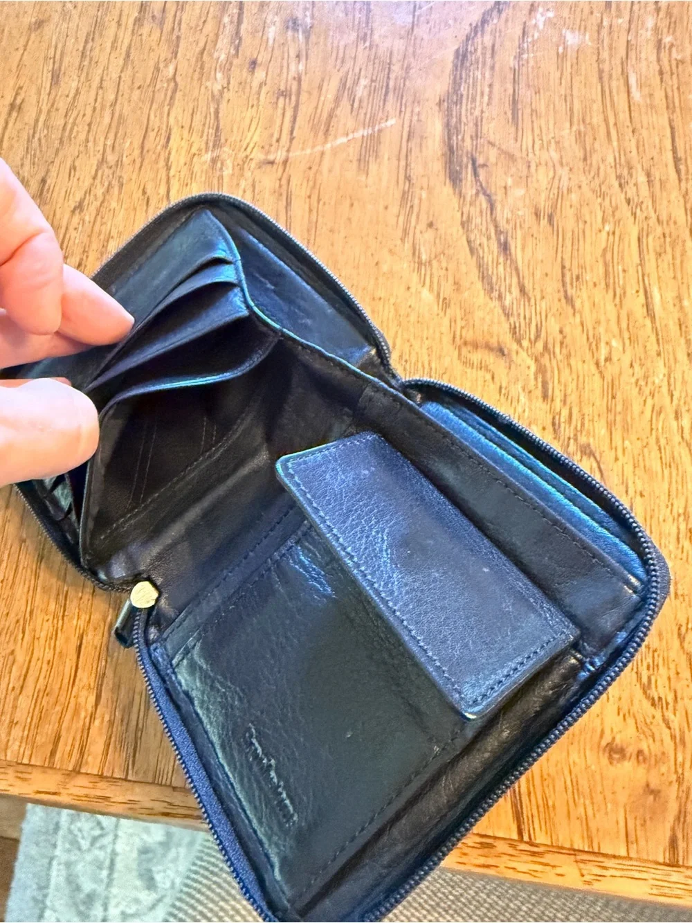 Brookstone Black Leather Zip Wallet with Embossed Logo
